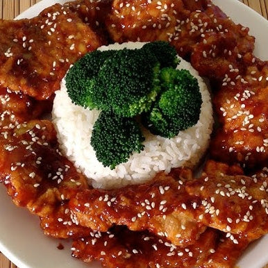 J7. Pork chops with Beijing sauce on Rice (sweet and sour)